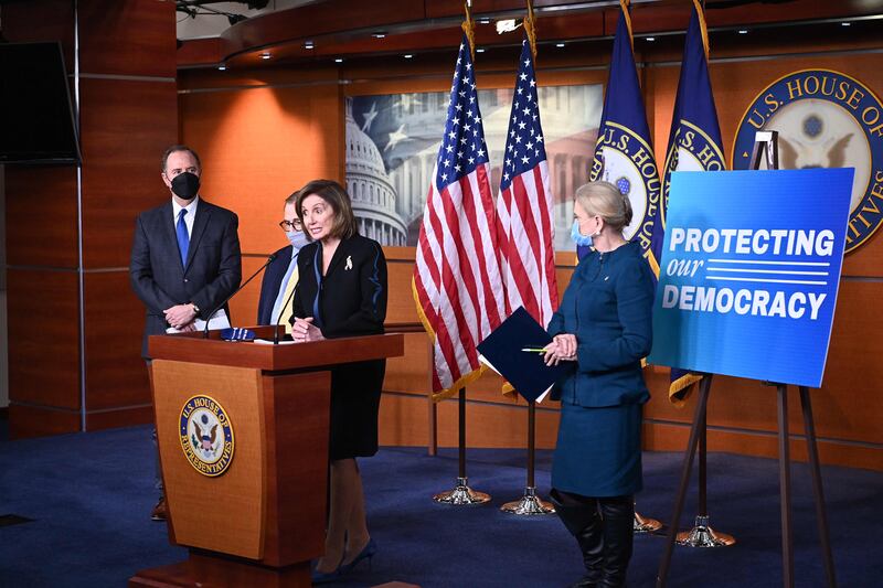 US Speaker of the House Nancy Pelosi, with Representatives Adam Schiff (L), Jerry Nadler (2nd L) and Carolyn Maloney (R), speaks during a press conference on ”Protecting Our Democracy Act” in the US Capitol in Washington, on December 9. AFP
