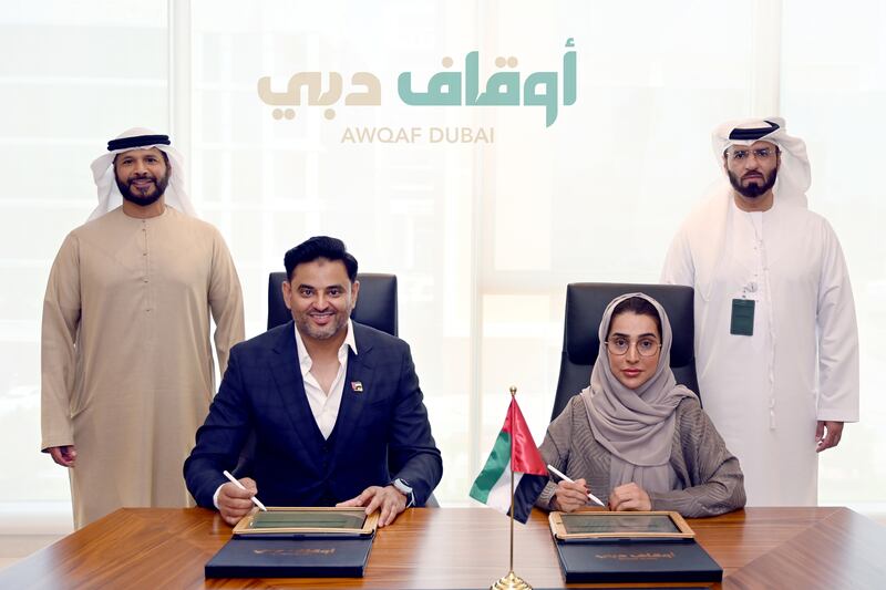 From left, Marwan bin Ghalita, chief executive of Rera; Atif Rahman, founder and chairman of ORO24 Real Estate Developments; Zainab Al Tamimi, director of the Mohammed bin Rashid Global Centre for Awqaf and Endowment; and Ali Al Mutawa, secretary general of Dubai Endowment. Photo: Dubai Media Office