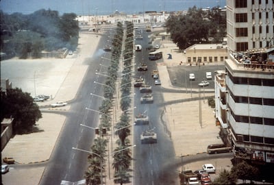 RESIZED Aerial view of Iraqi tanks as they drive along a tree-lined boulevard during that country's invasion of Kuwait City, Kuwait, August 2, 1990. (Photo by The LIFE Images Collection/Getty Images)