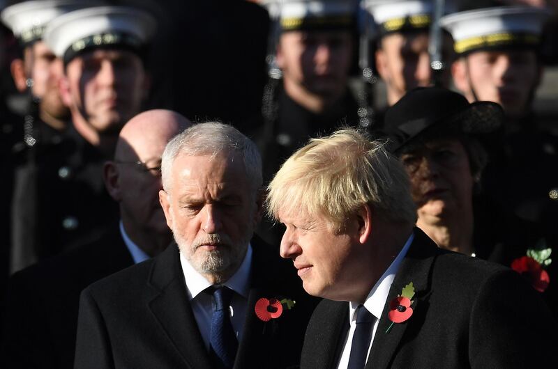 epa07985864 British Prime Minister Boris Johnson (R) with Labour Party leader Jeremy Corbyn (L)  at the Cenotaph on Whitehall during the Remembrance Sunday day service in London, Britain, 10 November 2019.  Britain is remembering its war dead on the 101st anniversary since the end of the first world war.  EPA/ANDY RAIN