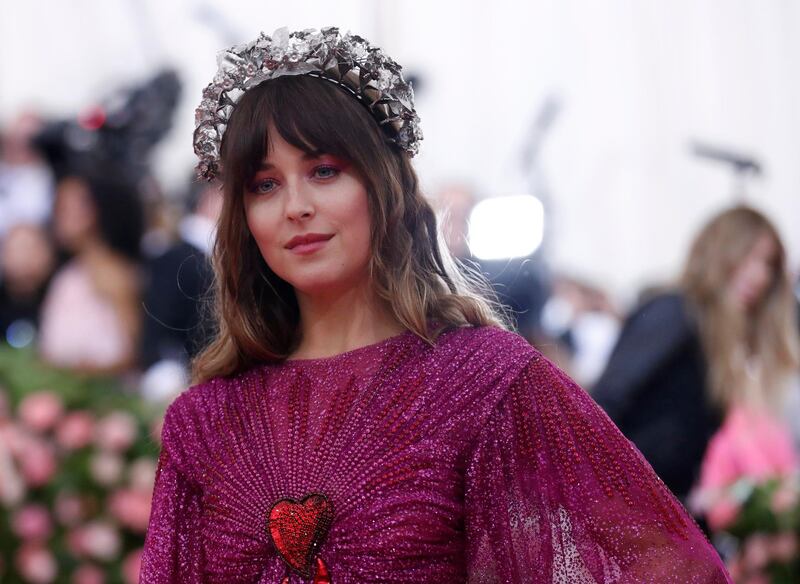 Dakota Johnson nailed a generous sweep of fuchsia eyeshadow, which she teamed with slightly less intense pink lips. AFP