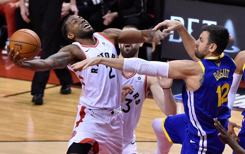 Toronto Raptors forward Kawhi Leonard gets a shot blocked by Golden State Warriors centre Andrew Bogut. EPA