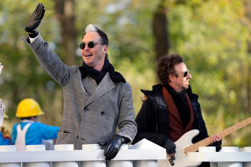 Michael Fitzpatrick from Fitz and the Tantrums rides the Lego float. AP