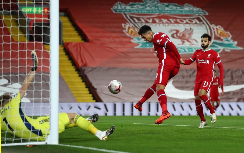 Liverpool's Roberto Firmino scores their first goal against Sheffield United at Anfield. Reuters