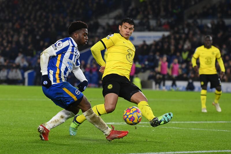 Tariq Lamptey of Brighton & Hove Albion crosses the ball under pressure from Thiago Silva of Chelsea during the Premier League match at American Express Community Stadium on January 18, 2022 in Brighton. The match finished 1-1. Getty Images