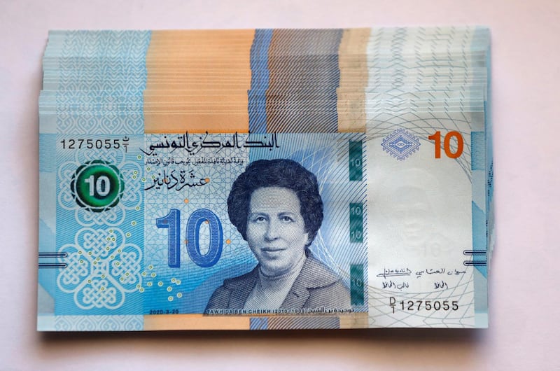 A portrait of the country's first woman doctor, Tawhida Ben Cheikh, is depicted on the new 10 Dinar banknotes. Reuters