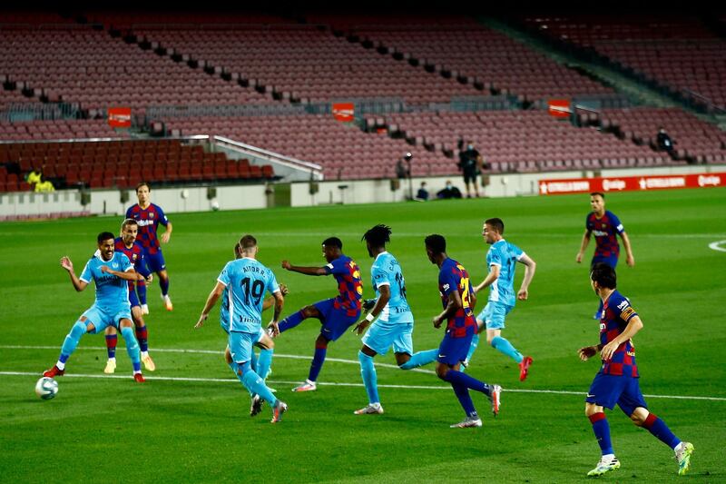 Ansu Fati, center, score Barcelona's opening goal against Leganes. AP Photo