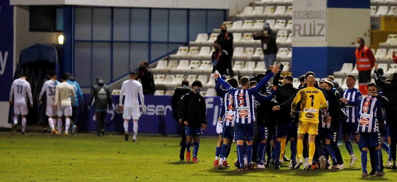 Alcoyano players celebrate their victory against Real Madrid. EPA