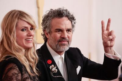 Sunrise Coigney and Mark Ruffalo, who is wearing a red badge calling for a ceasefire in Gaza. AFP 
