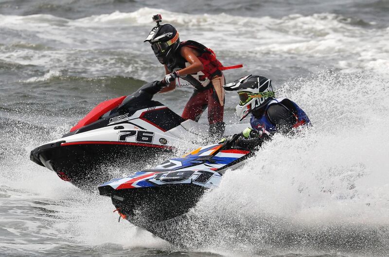 Jetski - 2018 Asian Games - Runabout 1100 Stock Final - Moto 3 - Jet-Ski Indonesia Academy - Jakarta, Indonesia - August 24, 2018 - Attapon Kunsa of Thailand and Sultan Alhammadi of the United Arab Emirates compete. REUTERS/Beawiharta