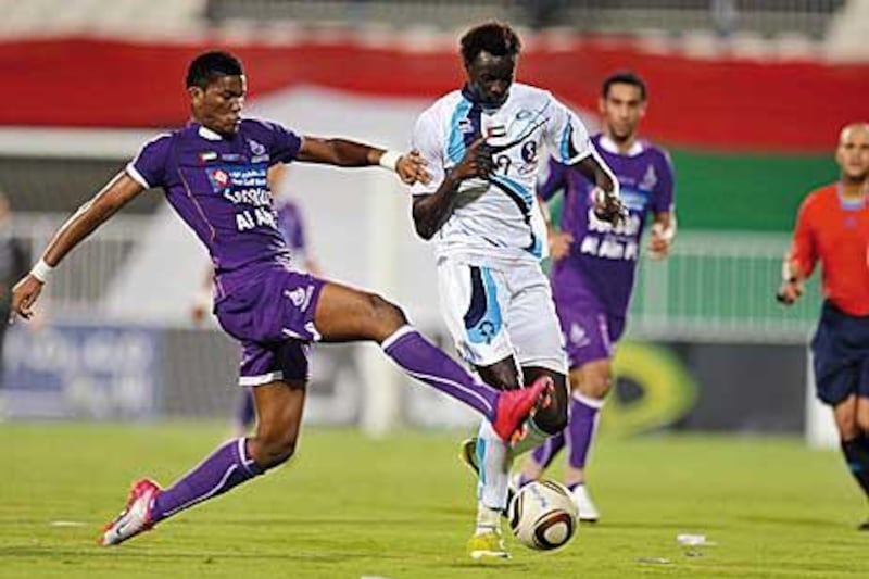 Andre Senghor, right, showed Al Ain what they were missing with a brace last night.