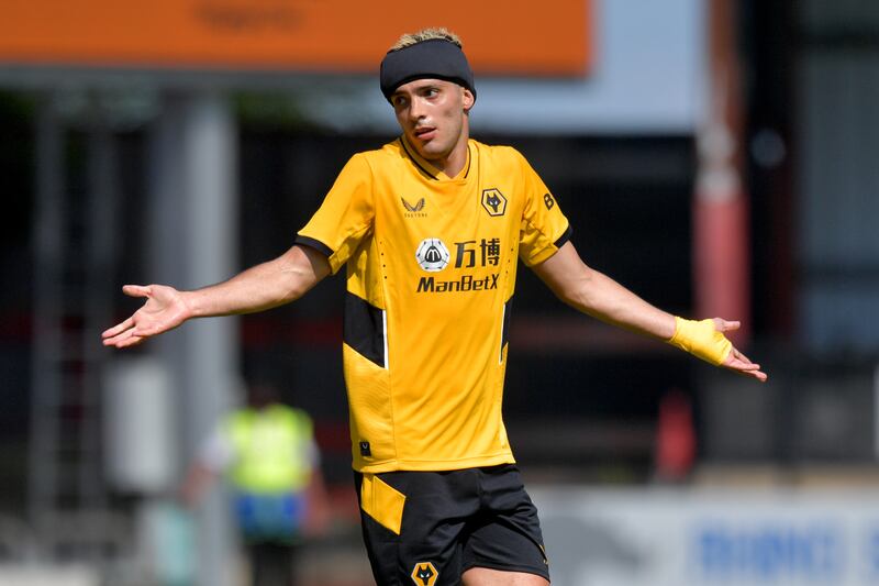 Wolves striker Raul Jimenez returned to action wearing a head protector after suffering a fractured skull in November.