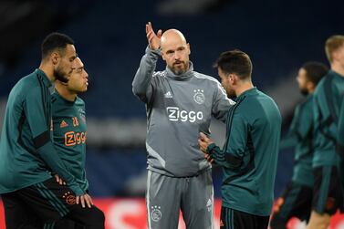 Erik Ten Hag takes charge of training ahead of Ajax's Champions League match against Chelsea. Getty Images