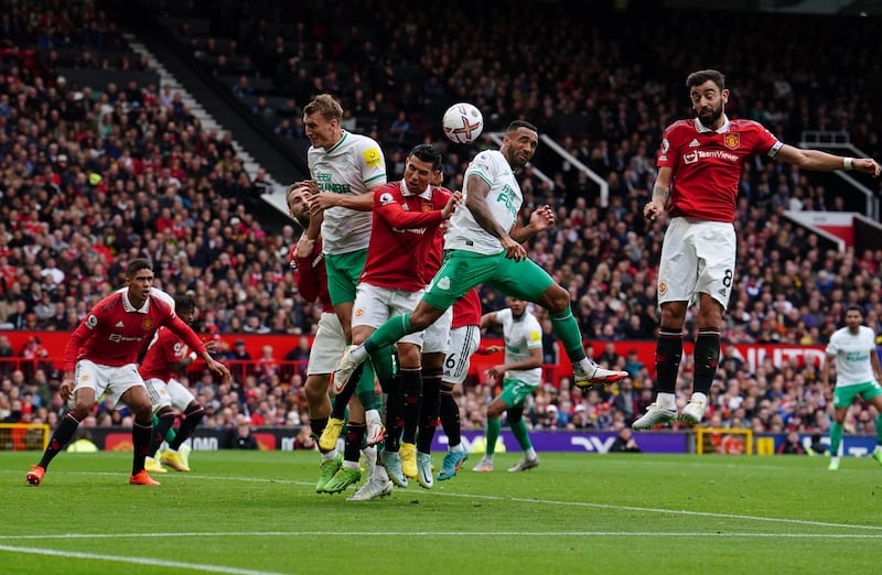 Newcastle striker Callum Wilson has an attempt on goal in first half of the Premier League match at Old Trafford. PA