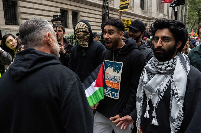 A pro-Israel supporter argues with people marching in support of Palestine in New York City. Getty Images