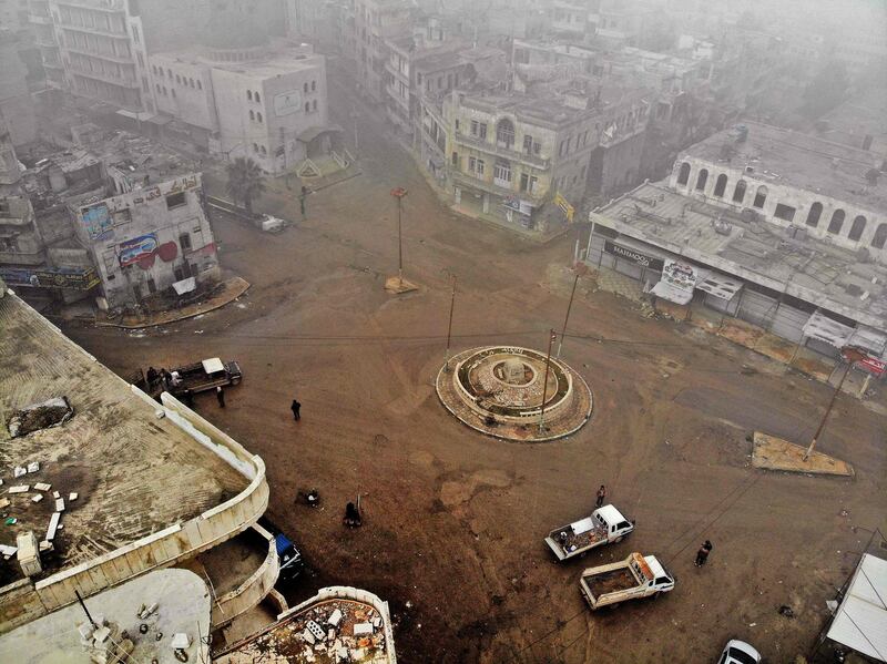 An aerial view shows nearly empty streets in the rebel-held town of Ariha in the northern countryside of Syria's Idlib province following an air strike by pro-regime forces. AFP