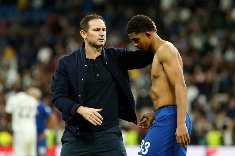 Chelsea head coach Frank Lampard comforts defender Wesley Fofana at the end of the Champions League quarter-final first leg defeat to Real Madrid. EPA