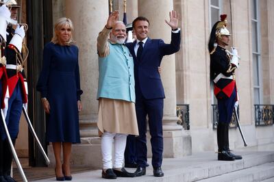 Brigitte Macron, left, joins the two leaders before France and India agreed to use the Unified Payments Interface. EPA
