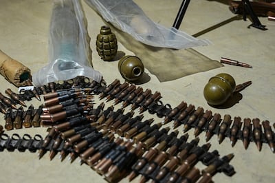 Belts of machine gun ammunition and hand grenades. Finbar Anderson / The National