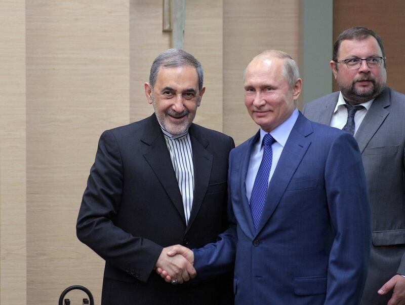 Russian President Vladimir Putin shakes hands with Ali Akbar Velayati, a top advisor to Iran's Supreme Leader Ayatollah Ali Khamenei, during their meeting at the Novo-Ogaryovo state residence outside Moscow, Russia July 12, 2018. Sputnik/Alexei Druzhinin/Kremlin via REUTERS ATTENTION EDITORS - THIS IMAGE WAS PROVIDED BY A THIRD PARTY.