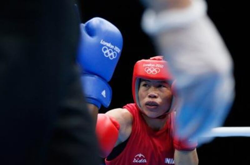 Mery Kom won bronze for India in the women's boxing 51kg division.