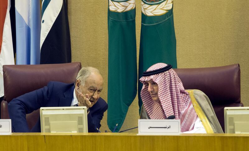 Arab League chief Ahmed Abul Gheit talks to Saudi Arabia's Foreign Minister Adel al-Jubeir, right, during Arab Foreign Ministers meeting at the Arab League headquarters in Cairo, Egypt, Thursday, May 17, 2018. Abul Gheit called for an international probe into alleged "crimes" committed by Israeli forces against Palestinians during deadly violence along the Gaza border this week. (AP Photo/Amr Nabil)