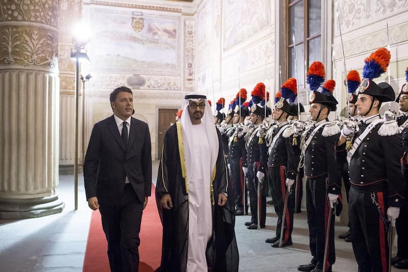 Sheikh Mohammed bin Zayed, Crown Prince of Abu Dhabi and Deputy Supreme Commander of the Armed Forces, second left, is received by Matteo Renzi, Prime Minister of Italy, left, at the Museo di Palazzo Vecchio. Ryan Carter / Crown Prince Court - Abu Dhabi 