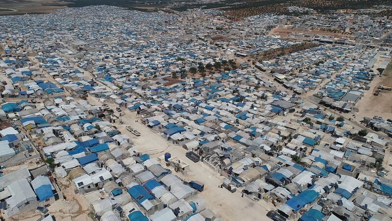 A picture captured by a drone showing hundreds of camps in Tal Al- Karama over the horizon.