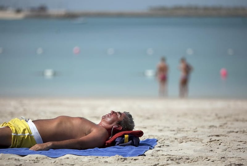 With the intensity of the summer sun in Abu Dhabi, whether you are hitting the beach or just going outside, wearing protective sun cream should be part of your daily routine.  Silvia Razgova / The National