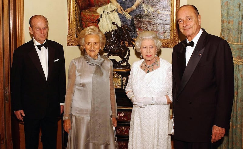 WINDSOR, ENGLAND - NOVEMBER 18:  (NO UK SALES FOR 28 DAYS) Queen Elizabeth II with the Duke of Edinburgh (L) stand with French President Jacques Chirac (R) and Madame Chirac (second from left), before attending a State banquet on November 18, 2004 at Windsor Castle, England.  The Queen hosted a state banquet at the castle for President Chirac of France in celebration of the centenary of the entente cordiale, after which the cast of the West End show 'Les Miserables', will perform songs from the musical set during the French revolutionary period. (Photo by ROTA/Getty Images)