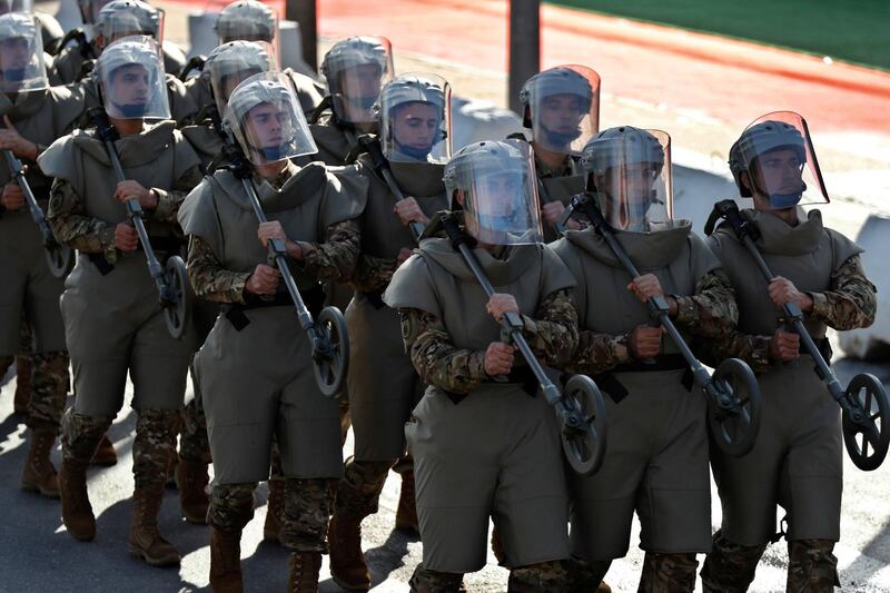 Lebanese soldiers from an explosives unit march during a military parade. AP Photo