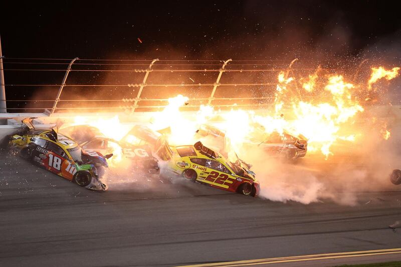 A fire breaks out during the crash at the at Daytona International Speedway. AFP