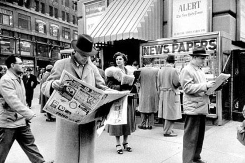 People buying out newspapers in Times Square during newspaer strike. Ralph Morse / Time Life Pictures / Getty Images