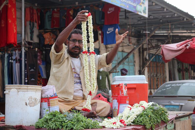 A vendor displays aromatic flower garlands in the southern Yemeni city of Lahj.