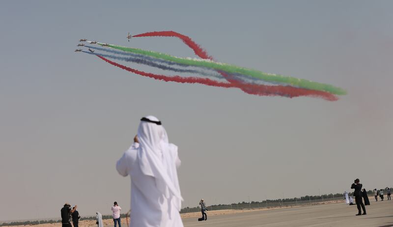 Members of the UAE Al Fursan aerobatics demonstration team during the Dubai Airshow 2021 at Dubai World Central – Al Maktoum International Airport. EPA