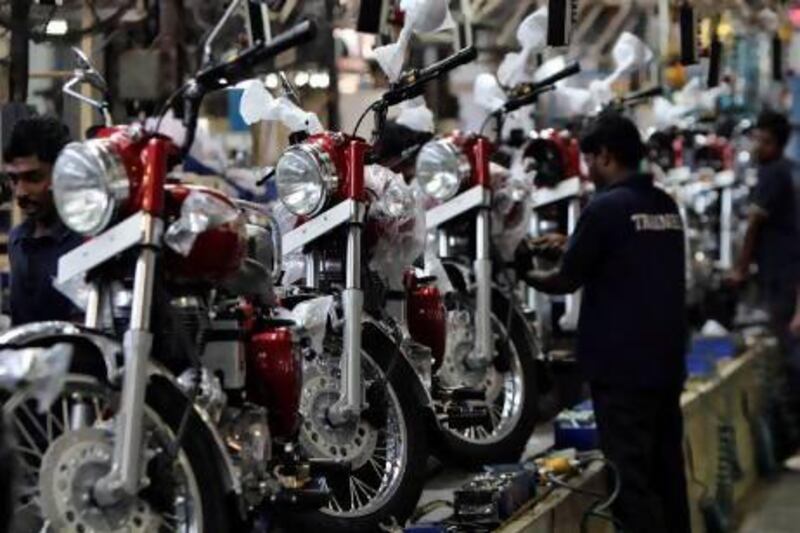 Workers assemble Royal Enfield motorcycles inside its factory in the southern Indian city of Chennai. Babu / Reuters
