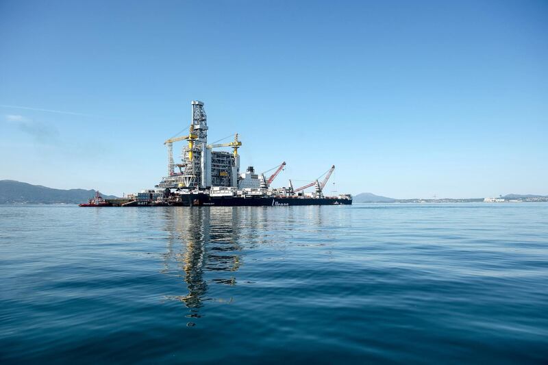 The H-627 barge carrier transports an oil drilling platform onto the world's��largest��construction vessel, the��Pioneering��Spirit,��in the Bomla fjord near Leirvik, ahead of its transportation to the Johan Sverdrup oil field, Norway, on Friday, June 1, 2018. Equinor ASA has reduced��the break-even price to below $20 a barrel in its flagship Johan��Sverdrup��oil project in the North Sea. Photographer: Carina Johansen/Bloomberg