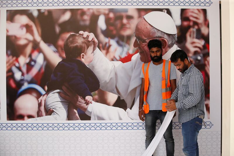 Last minute preparations at Sacred Heart Catholic Church in Manama.