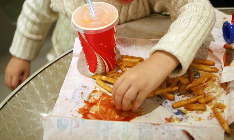 March 4, 2009 / Abu Dhabi/ Zahwa el Said, 4,  enjoys food from Popeyes in Abu Dhabi Mall March 4, 2009.  (Sammy Dallal / The National) *** Local Caption ***  sd-030409-fastfood-09.jpg