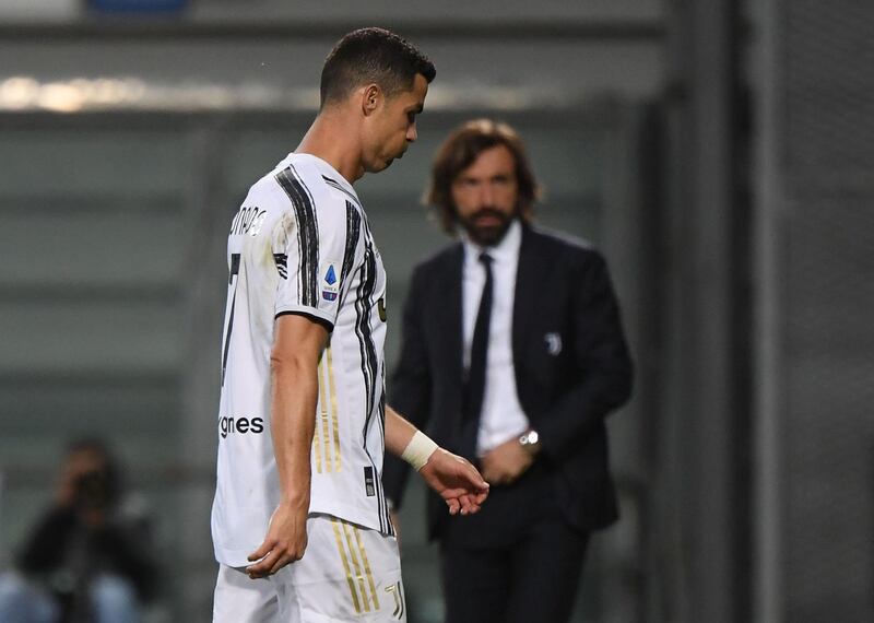 Juve's Cristiano Ronaldo and coach Andrea Pirlo. Reuters