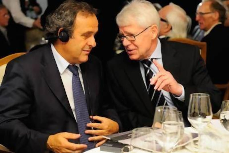 While attending the UEFA President's Award in Munich, Germany this week, UEFA president Michel Platini, left, explained why he thinks the 2022 World Cup should be played in the winter and be hosted by Qatar and its neighbouring countries. Lennart Preiss / Getty Images