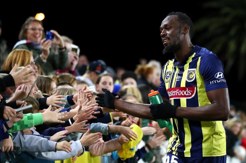 Usain Bolt greets during a pre-season friendly for Central Coast Mariners. Getty Images