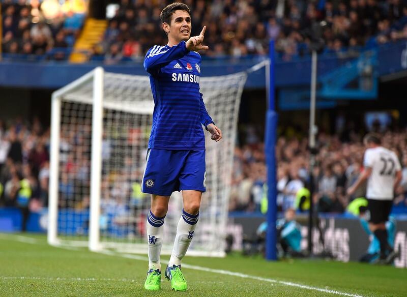 Oscar of Chelsea celebrates scoring in their Premier League victory over Queens Park Rangers on Saturday. Mike Hewitt / Getty Images / November 1, 2014  