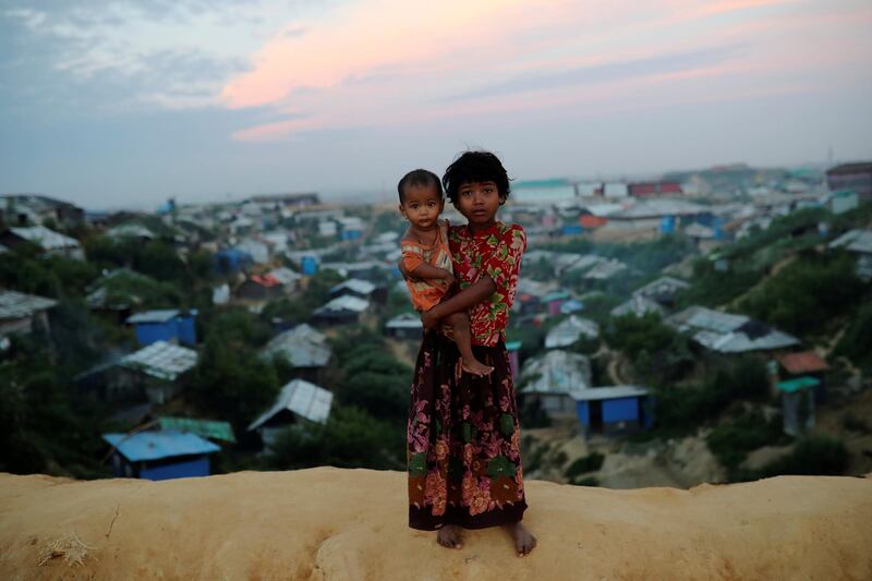 Rohingya refugee children pose for a picture at the Balukhali camp in Cox's Bazar, Bangladesh. Reuters