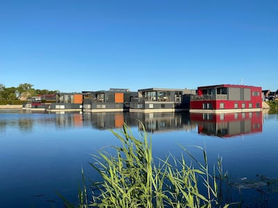 A floating community of seven water villas in Urk, the Netherlands. Photo: Waterstudio.NL

