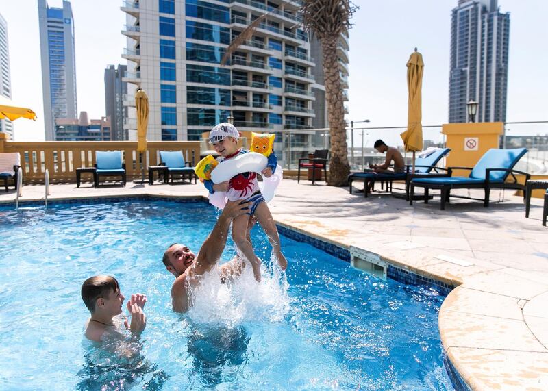 DUBAI, UNITED ARAB EMIRATES. 11 OCTOBER 2020. Only 5 are allowed inside the pool at the same time, as part of the  covid safety measures taken at Ramada Hotel and Suites by Wyndham Dubai JBR.(Photo: Reem Mohammed/The National)Reporter:Section: