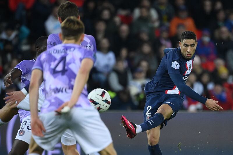 Paris Saint-Germain defender Achraf Hakimi shoots and scores to level at 1-1. AFP