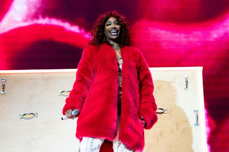 Grammy-nominated singer SZA, real name Solana Rowe, shared a photograph of her dad performing Eid prayers. AP Photo