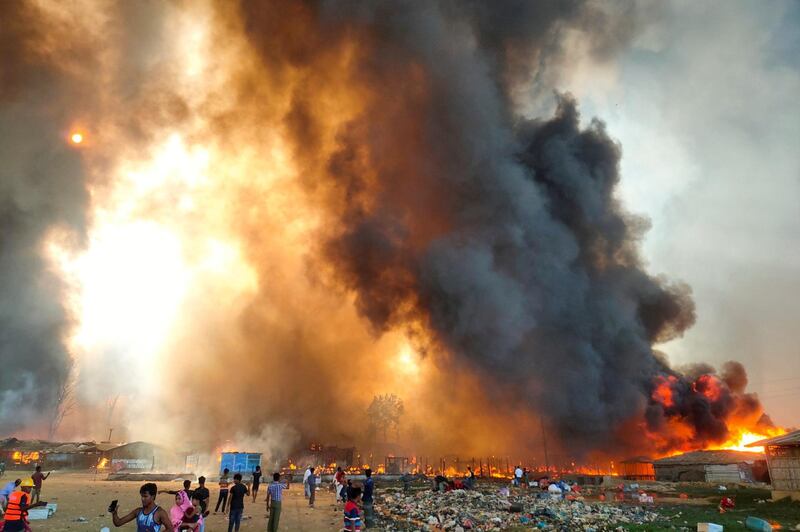 Smoke billows from the site of the Rohingya refugee camp, where fire broke out, in Cox's Bazar, Bangladesh. Reuters