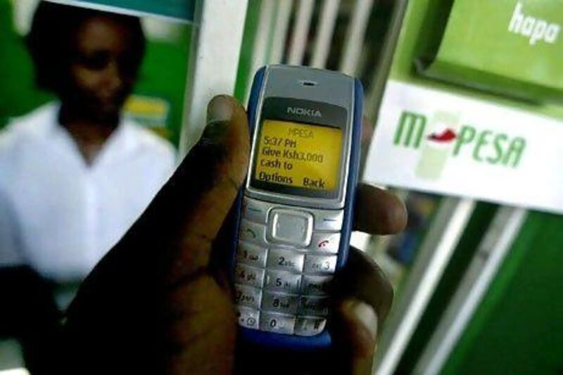 M-Pesa, one of the biggest providers of banking services in Kenya, provides deposits, payments and remittance services to its almost 14 million customers without a single branch. Tony Karumba / AFP